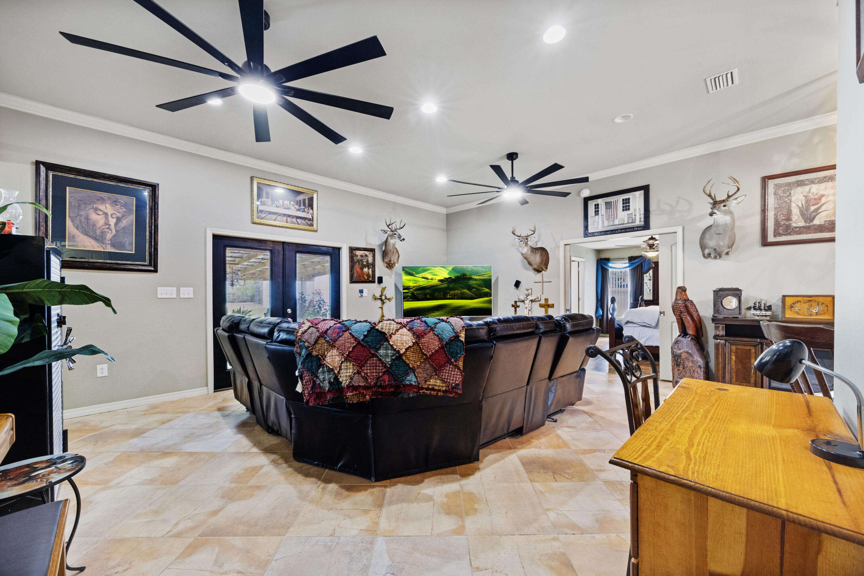 1582 Greenwood Road Baker, FL 32531 - Photo 8 of 52 a living room with furniture and a flat screen tv