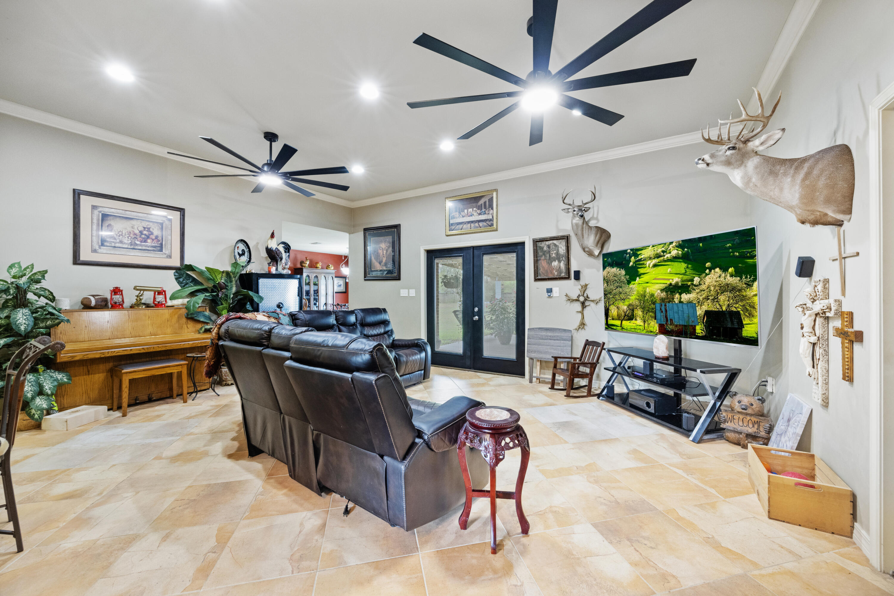 1582 Greenwood Road Baker, FL 32531 - Photo 9 of 52 a living room with furniture and a flat screen tv
