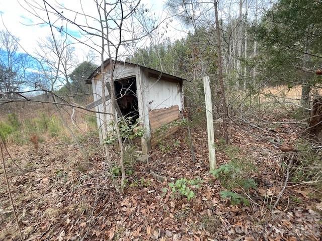 593 Brooks Road Bostic, NC 28018 - Photo 7 of 17 a backyard of a house with lots of green space