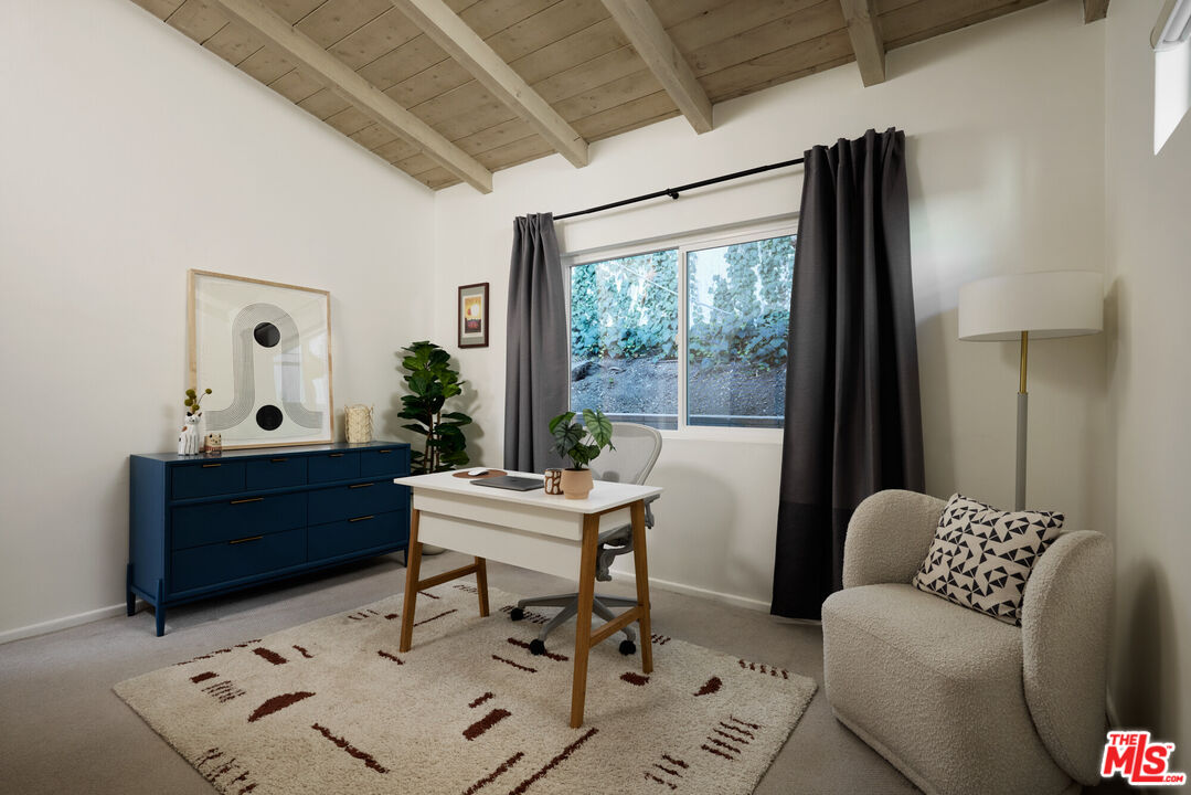 14833 Valley Vista Boulevard Sherman Oaks, CA 91403 - Photo 17 of 39 a living room with furniture and a window