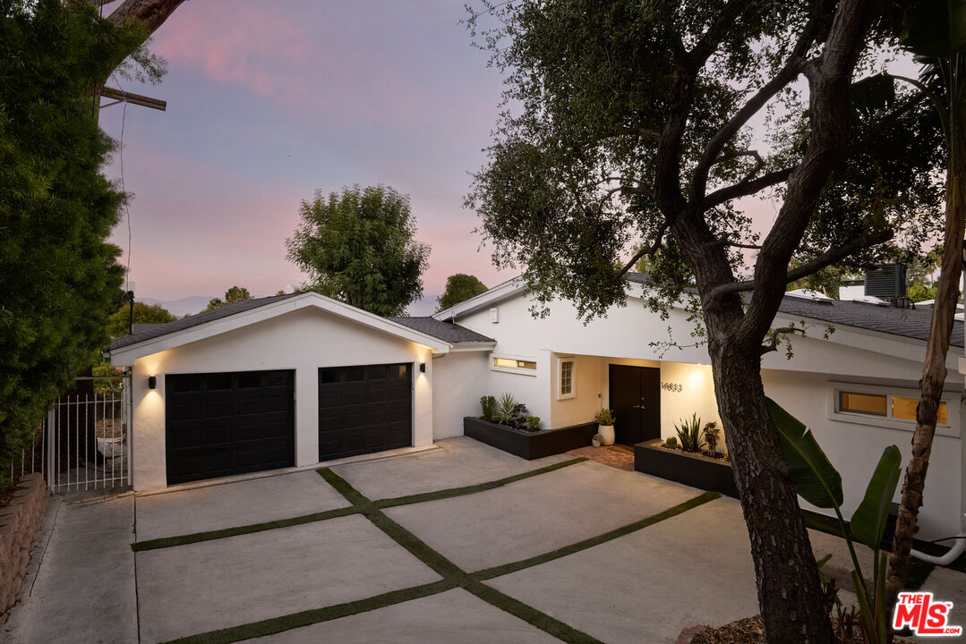 14833 Valley Vista Boulevard Sherman Oaks, CA 91403 - Photo 29 of 39 a front view of a house with yard