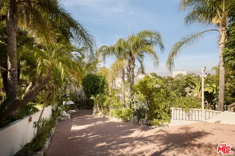an aerial view of residential building with parking space