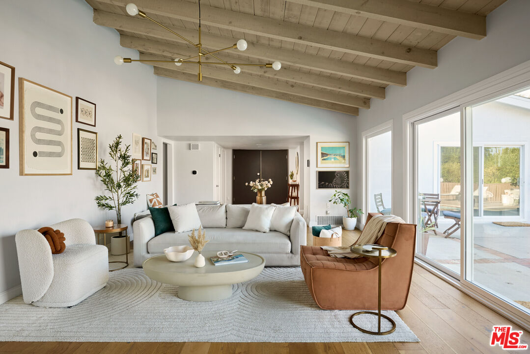 14833 Valley Vista Boulevard Sherman Oaks, CA 91403 - Photo 5 of 39 a living room with furniture and a large window
