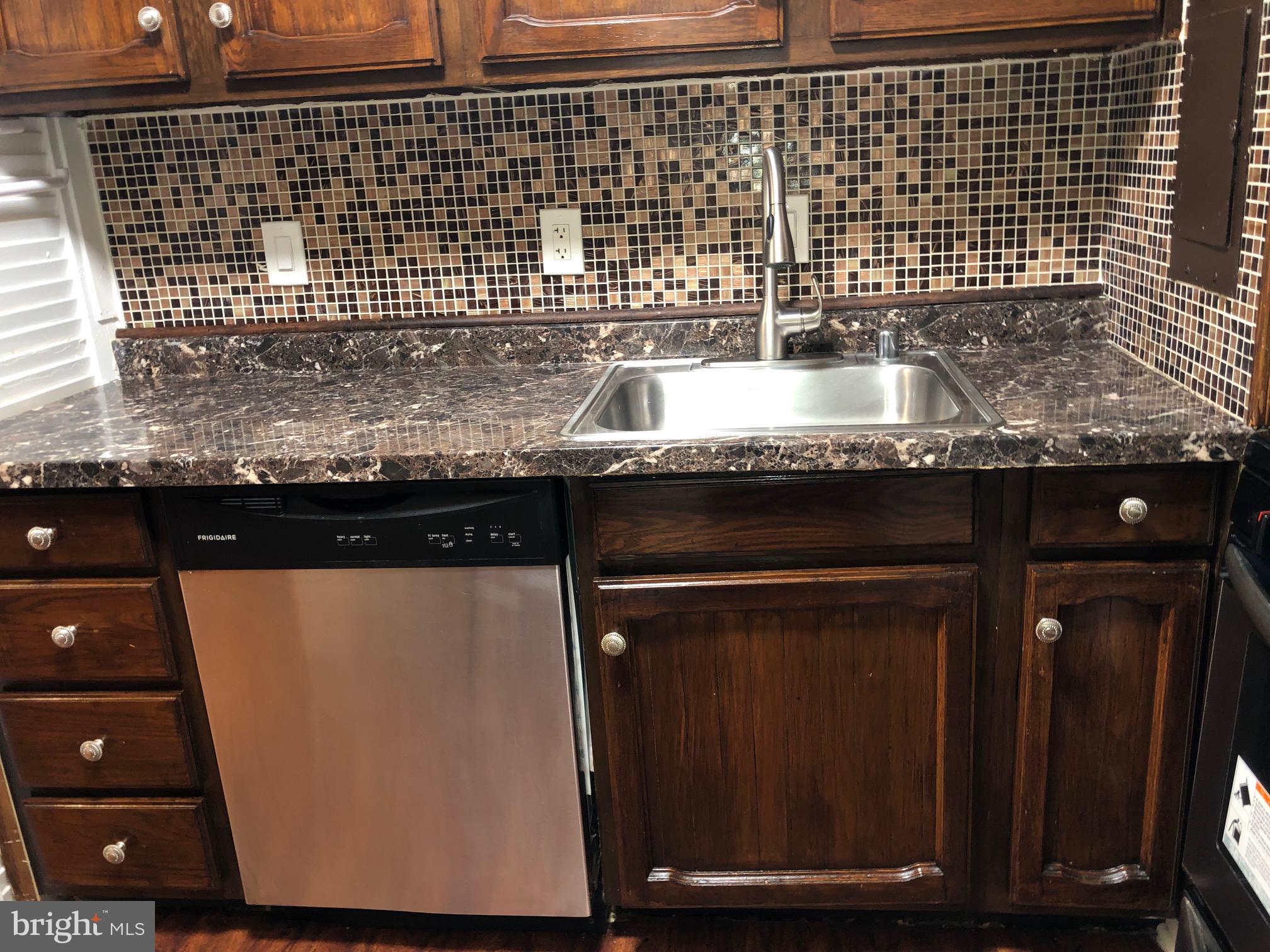 1804 Metzerott Road, Unit 308 Adelphi, MD 20783 - Photo 6 of 30 Corian Counters.