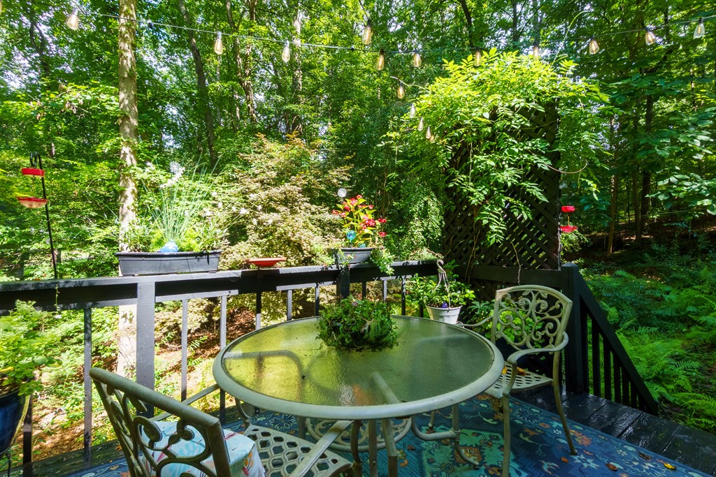 706 Magnolia Way Woodstock, GA 30188 - Photo 15 of 24 a view of a chairs and table in the patio