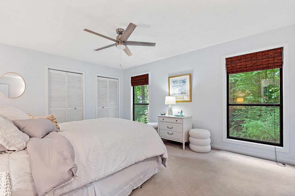 706 Magnolia Way Woodstock, GA 30188 - Photo 19 of 24 a bedroom with a bed and window