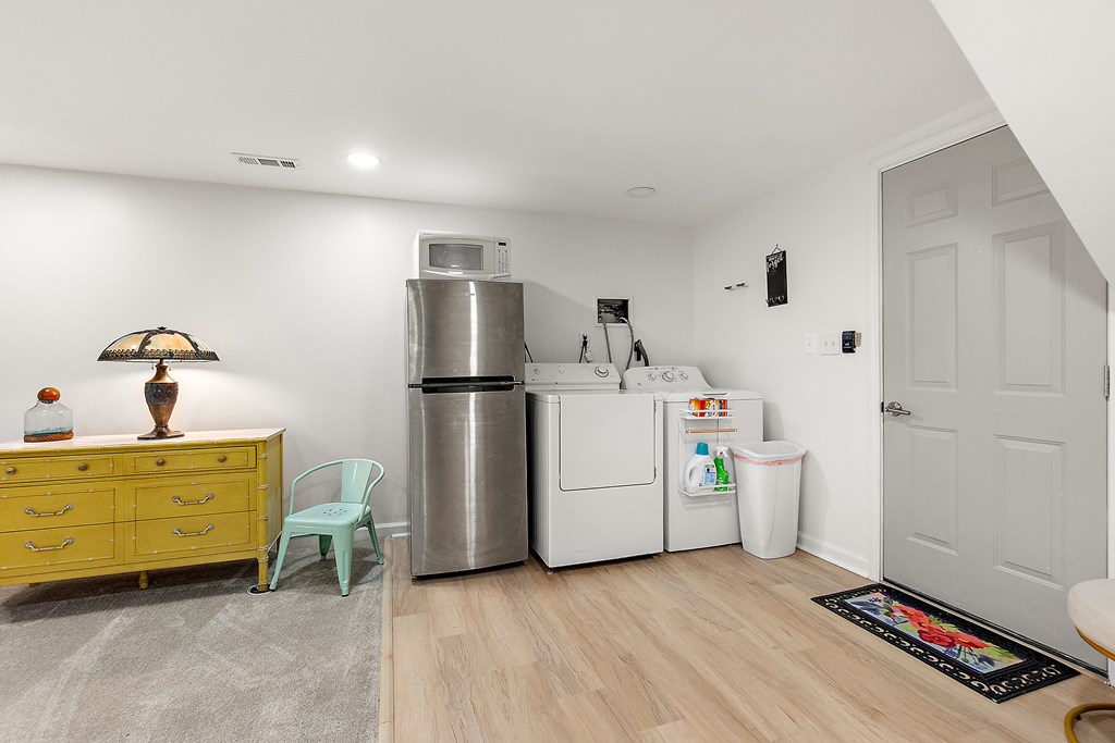706 Magnolia Way Woodstock, GA 30188 - Photo 23 of 24 a storage room with cabinets