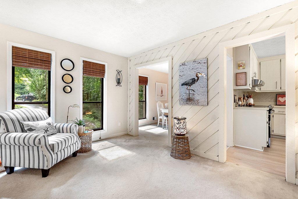 706 Magnolia Way Woodstock, GA 30188 - Photo 6 of 24 a bedroom with furniture and a large window