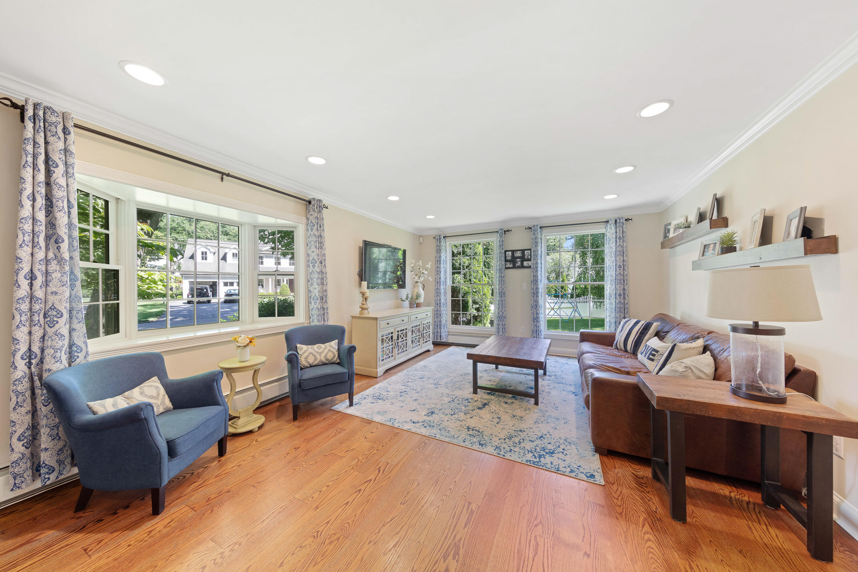 12 Miles Road Darien, CT 06820 - Photo 12 of 31 a living room with furniture and a large window