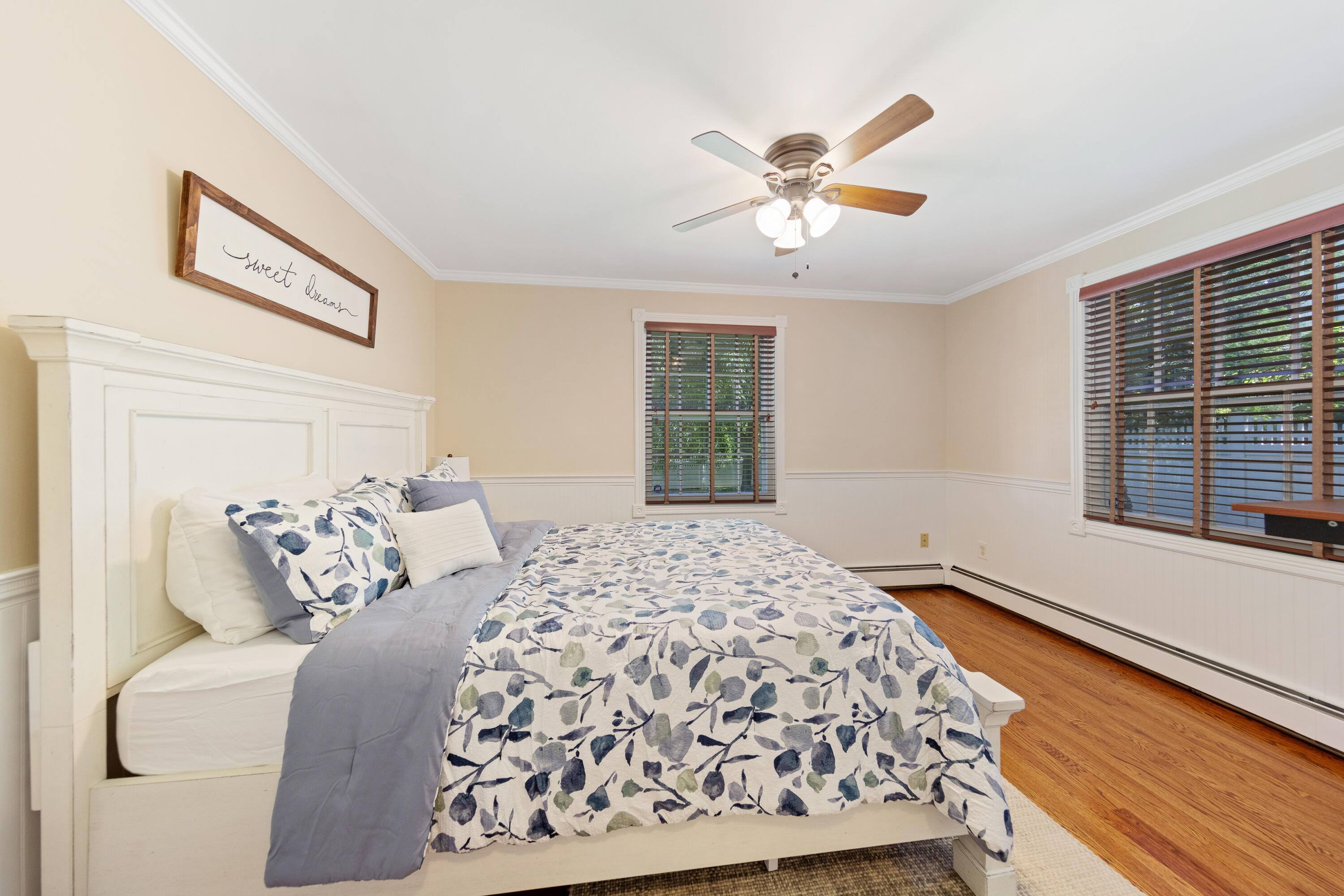 12 Miles Road Darien, CT 06820 - Photo 14 of 31 a bedroom with a large bed and a window