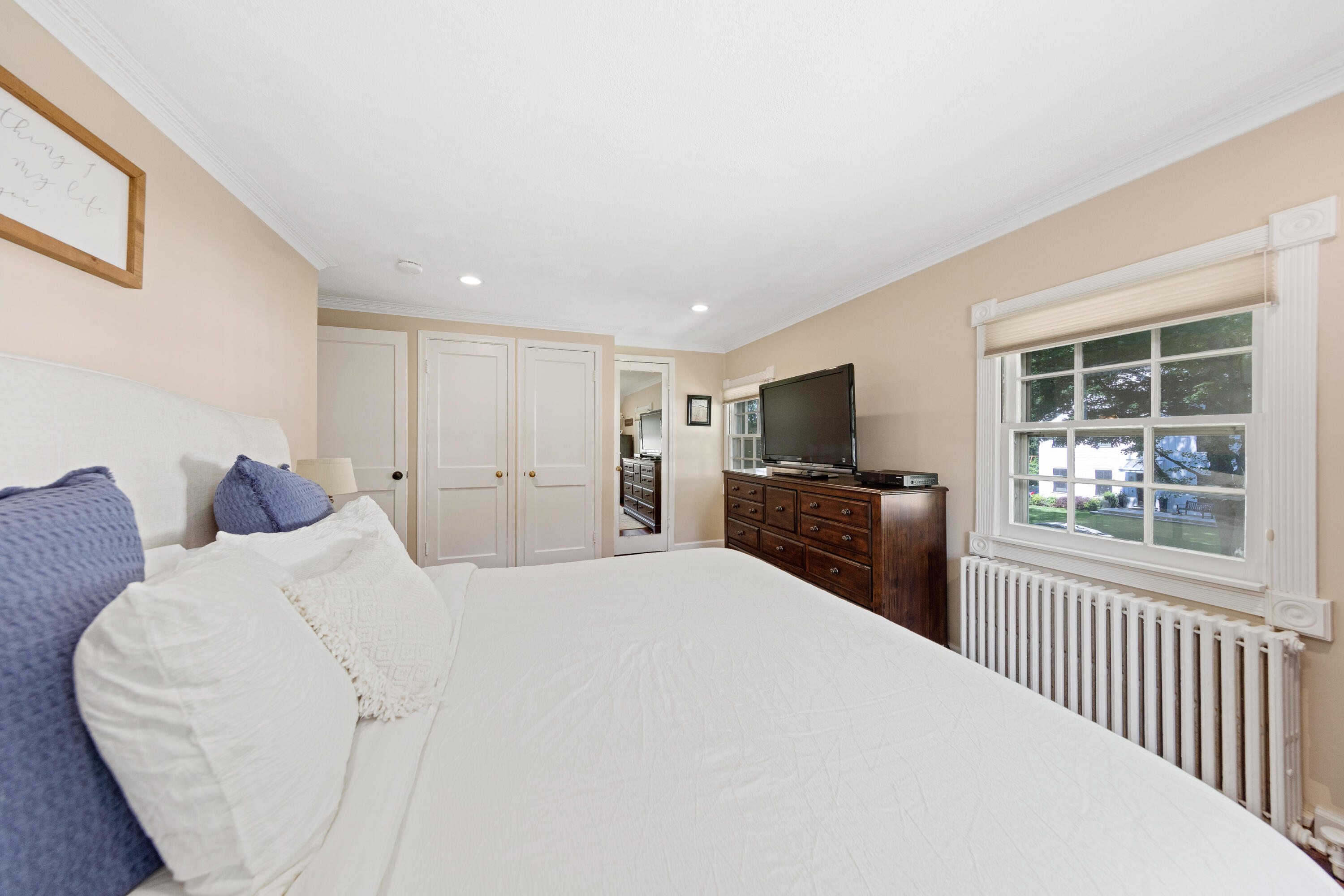 12 Miles Road Darien, CT 06820 - Photo 17 of 31 a large white bed in a white room