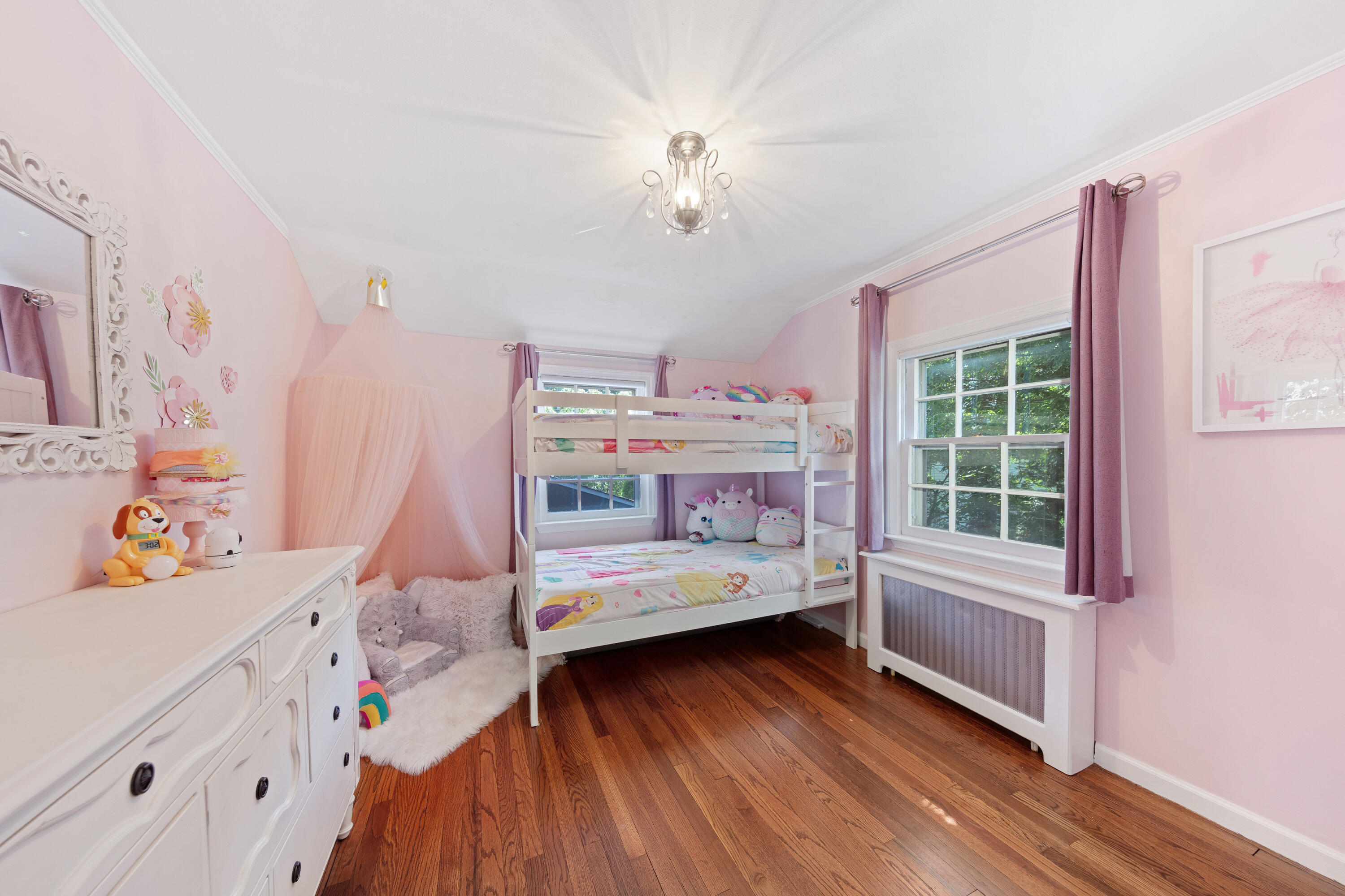 12 Miles Road Darien, CT 06820 - Photo 21 of 31 a bedroom with furniture and a wooden floor