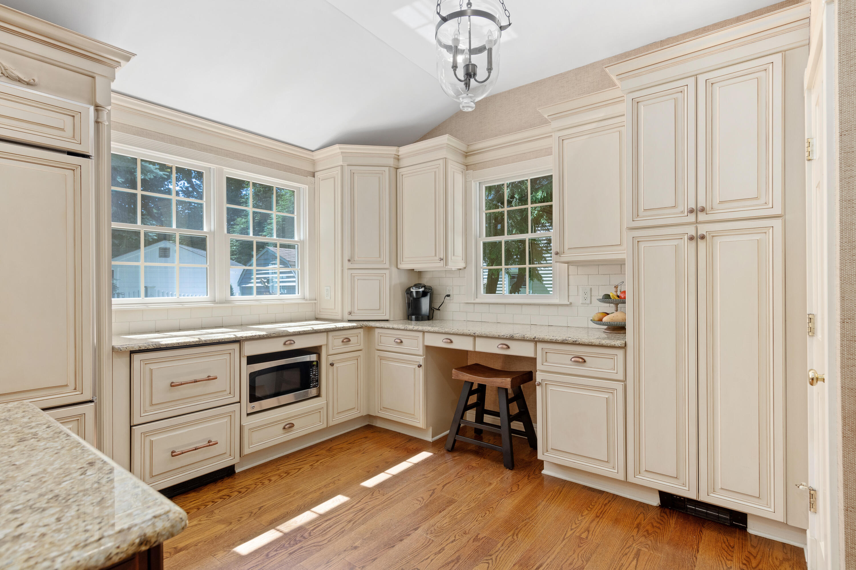 12 Miles Road Darien, CT 06820 - Photo 7 of 31 a kitchen with white cabinets and sink