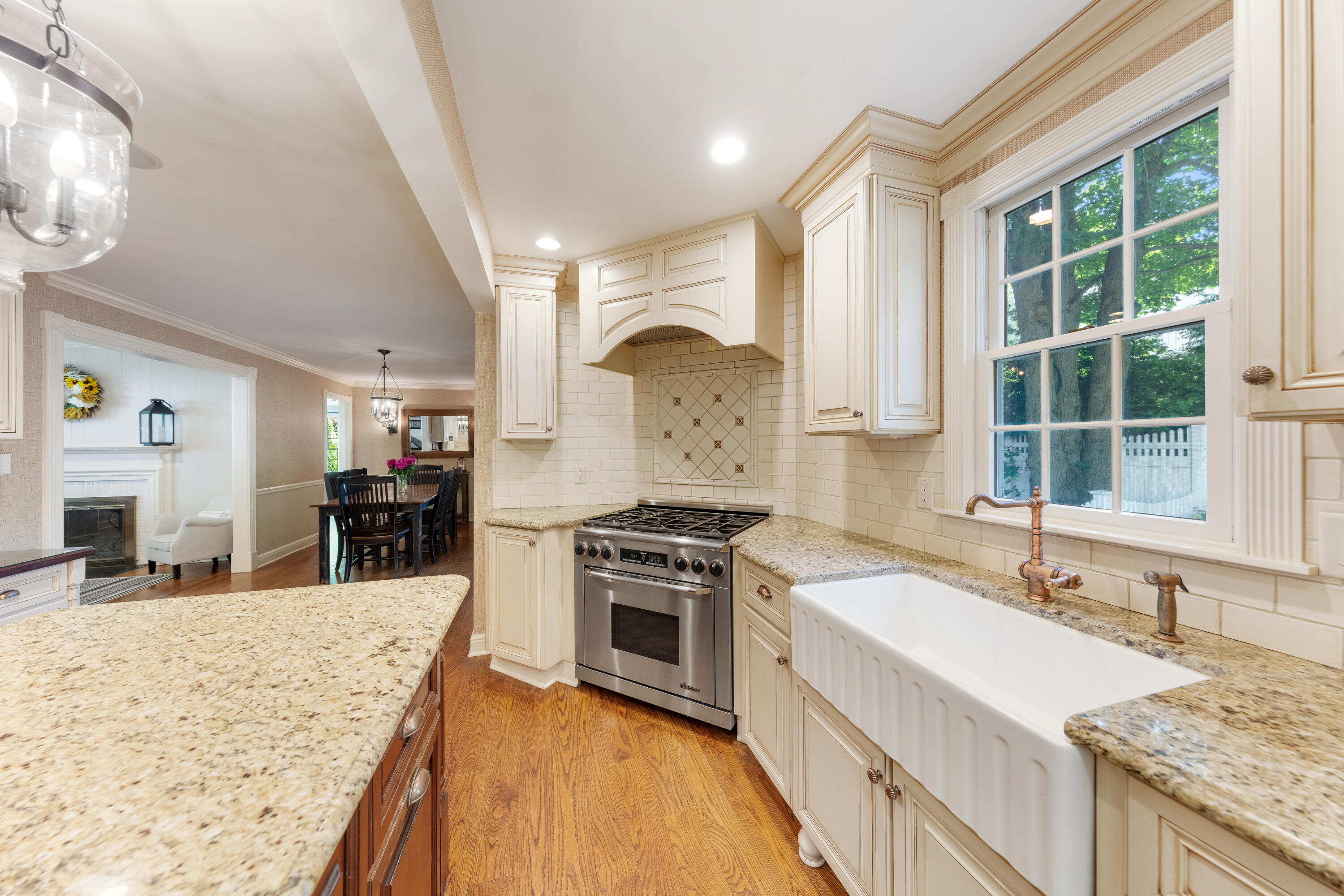 12 Miles Road Darien, CT 06820 - Photo 9 of 31 a kitchen with stainless steel appliances granite countertop a stove and a sink