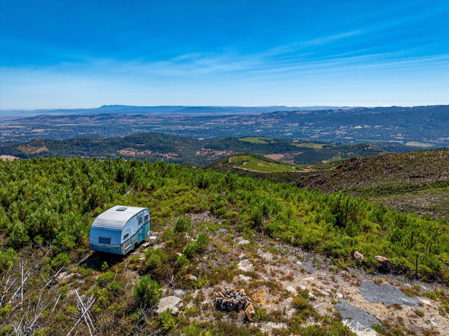 4420 Cavedale Road Sonoma, CA 95476 - Photo 11 of 25 Southerly view from flat area with gently slopes to lower accessible areas. Napa County property boarder to the left.