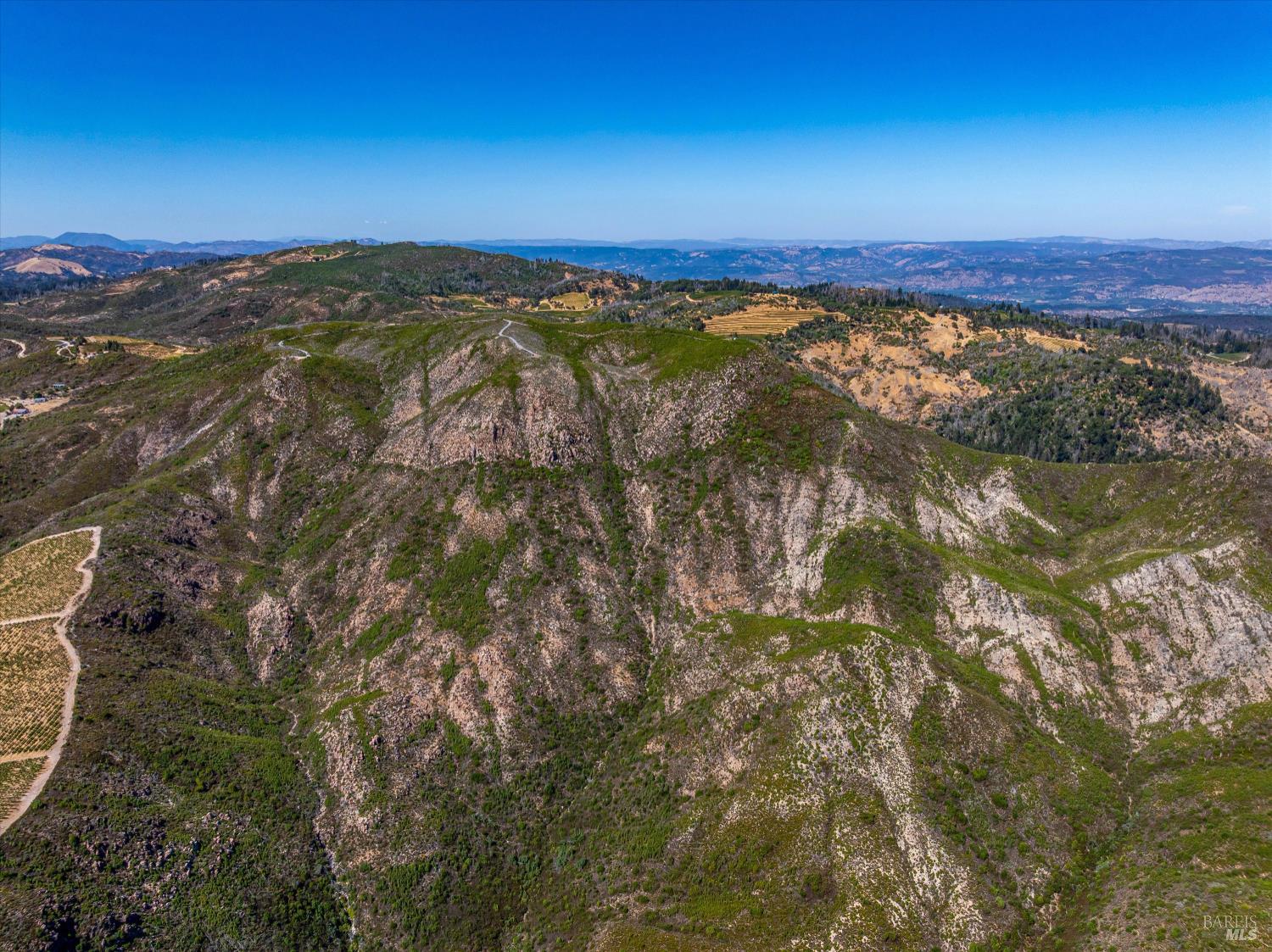 4420 Cavedale Road Sonoma, CA 95476 - Photo 16 of 25 High Aerial photo showing a good amount of the 100 acre parcel.