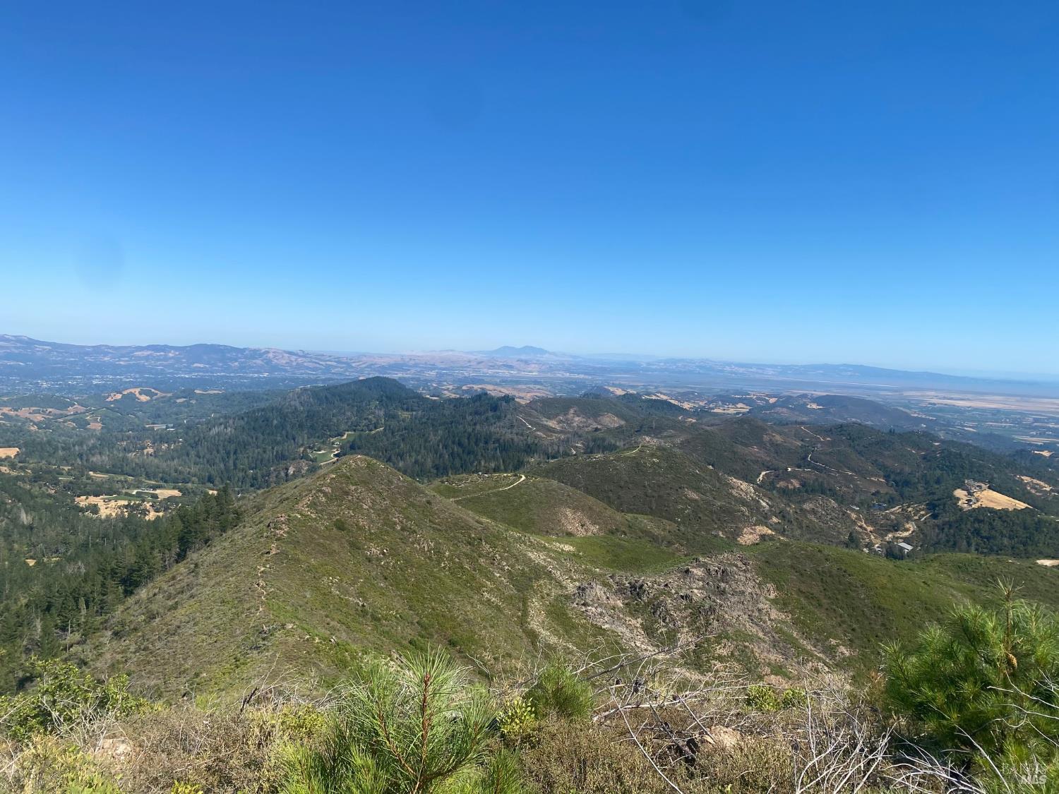 4420 Cavedale Road Sonoma, CA 95476 - Photo 20 of 25 Left ridge with trail is part of this property and is seen from the flat area where the trailer is placed.