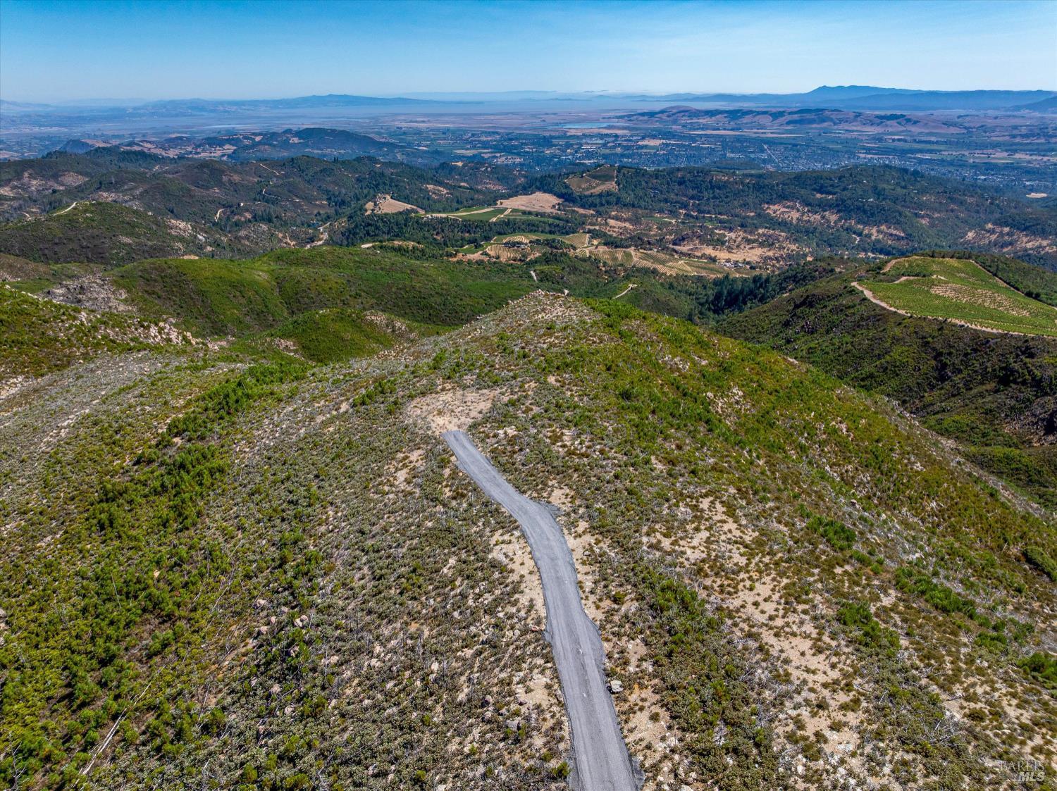 4420 Cavedale Road Sonoma, CA 95476 - Photo 6 of 25 Aerial shot of building site at the end of the road. gentle slopes and views all around.