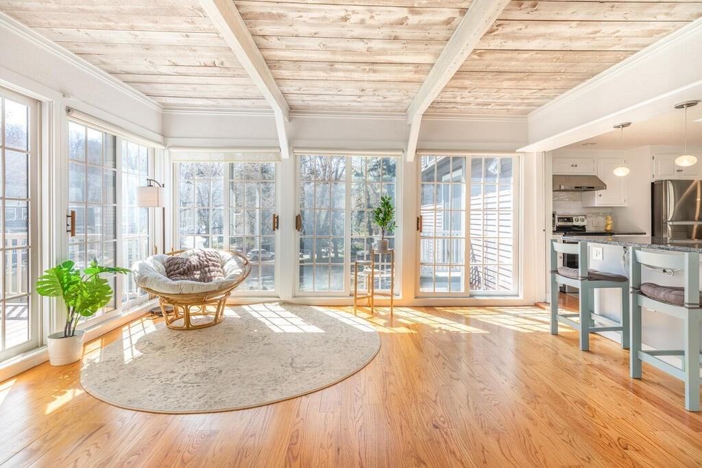 382 Worcester Street Wellesley, MA 02481 - Photo 11 of 22 a view of a living room and kitchen with furniture