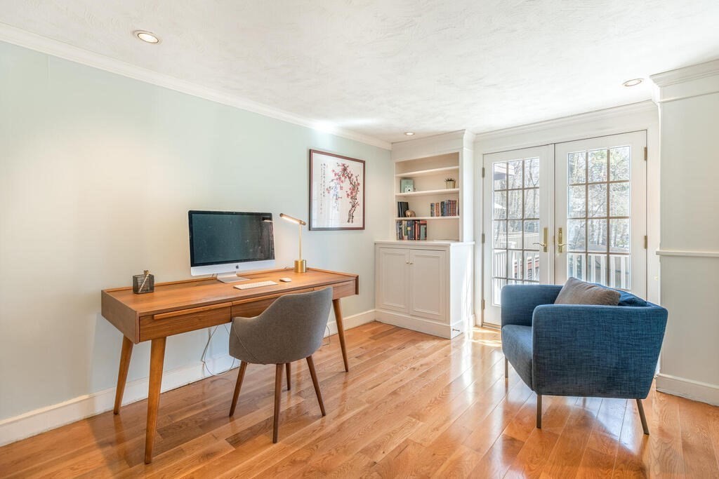 382 Worcester Street Wellesley, MA 02481 - Photo 12 of 22 a view of a livingroom with furniture and a window