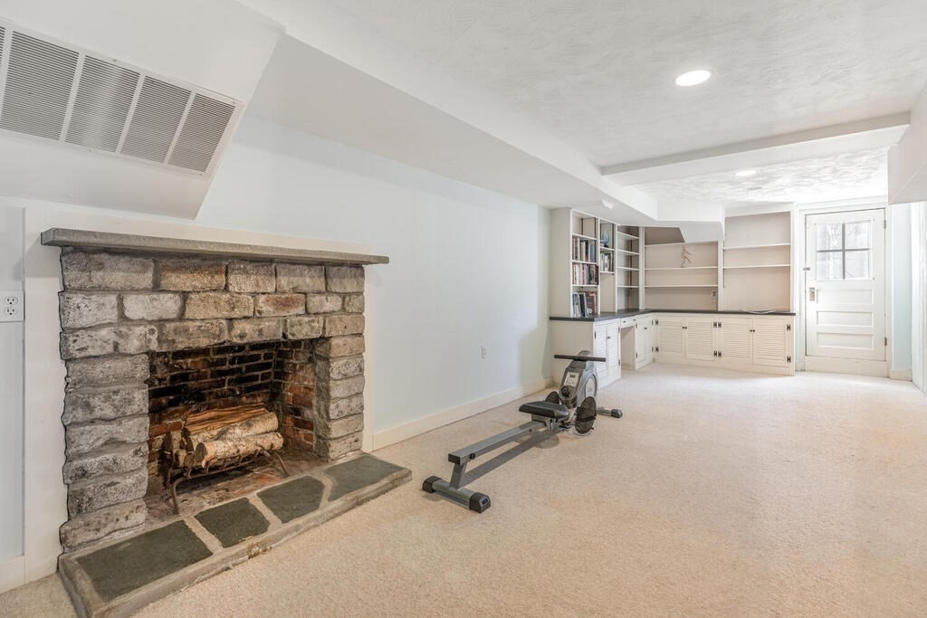 382 Worcester Street Wellesley, MA 02481 - Photo 18 of 22 a room with gym equipment