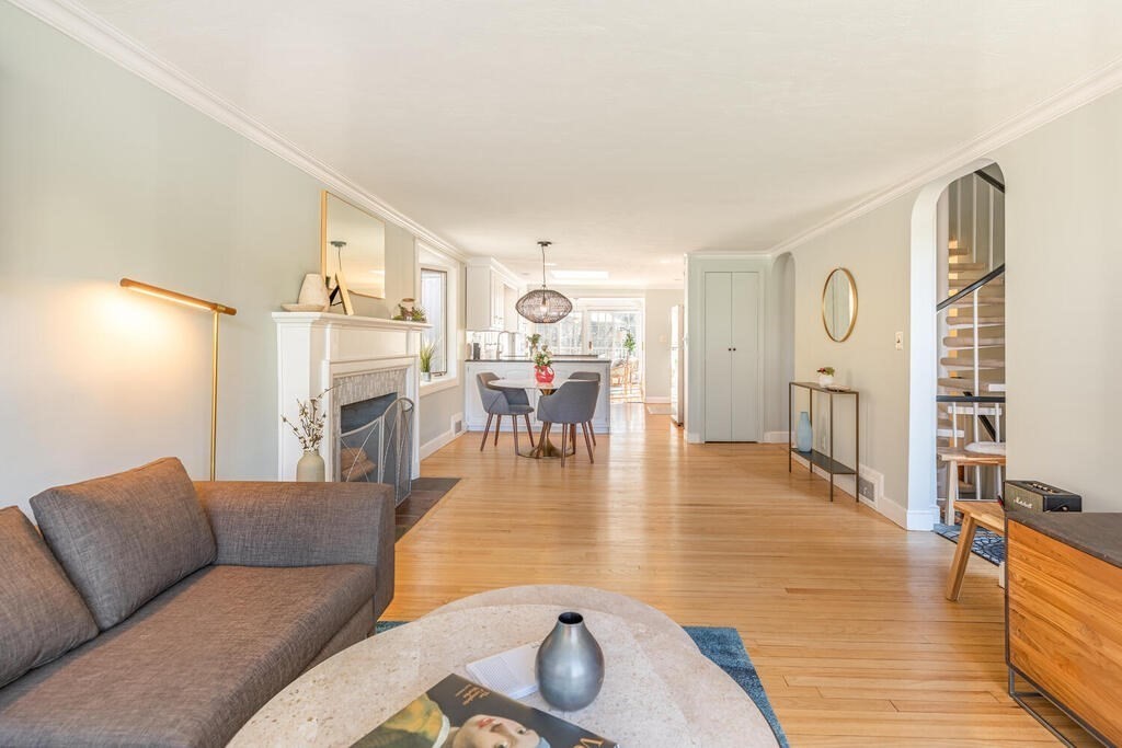 382 Worcester Street Wellesley, MA 02481 - Photo 4 of 22 a living room with furniture and wooden floor