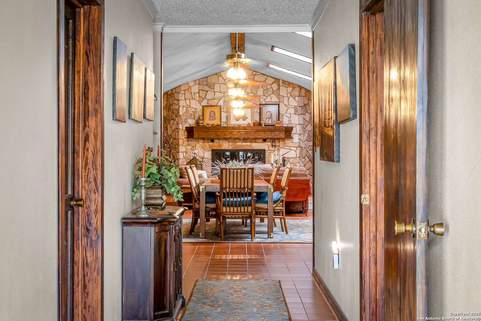 200 Elm Creek Road New Braunfels, TX 78132 - Photo 22 of 45 a dining room with furniture wooden floor a glass table and chairs