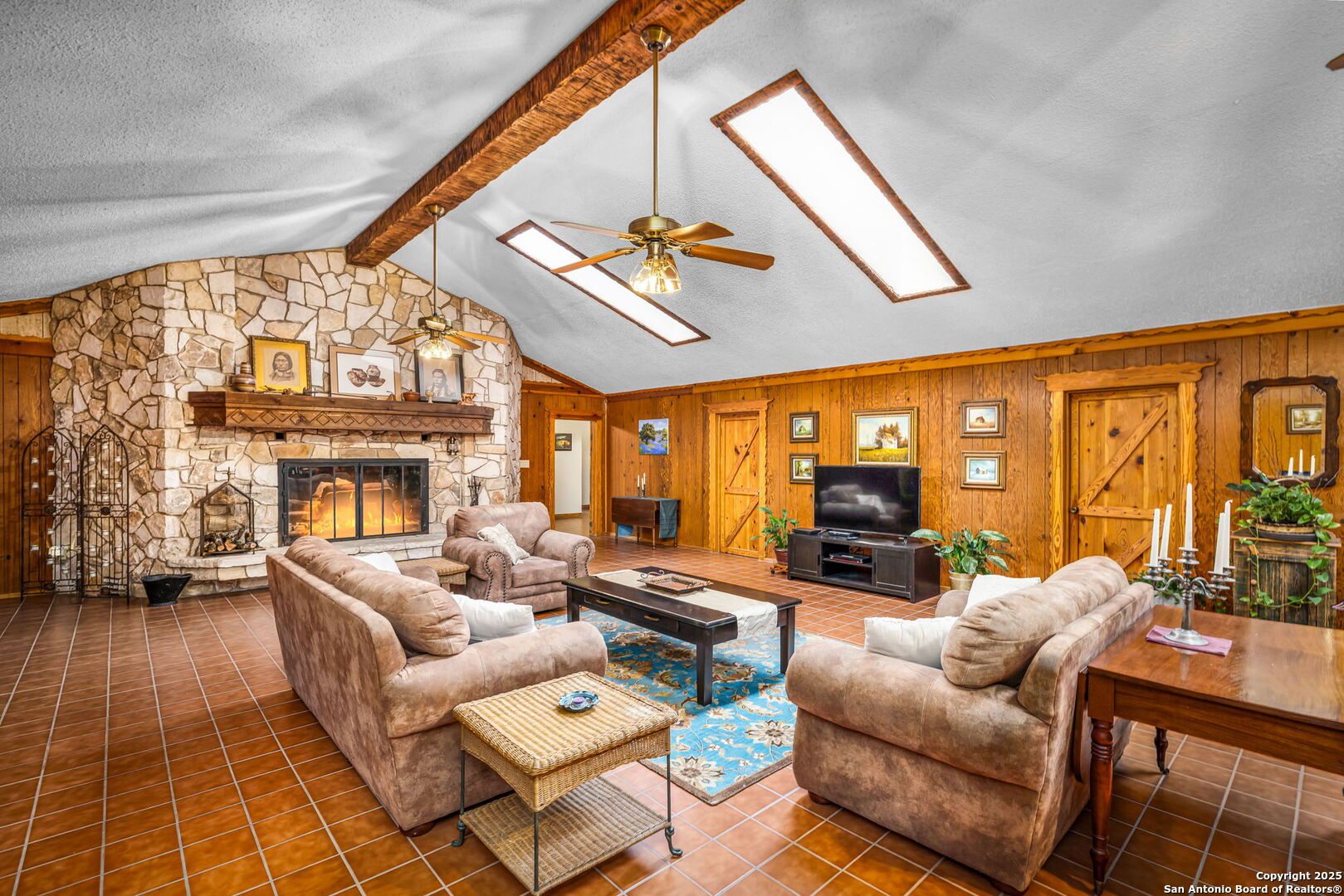 200 Elm Creek Road New Braunfels, TX 78132 - Photo 25 of 45 a living room with fireplace furniture and a large window