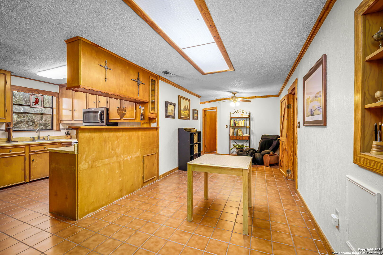 200 Elm Creek Road New Braunfels, TX 78132 - Photo 38 of 45 a bedroom with furniture and a kitchen