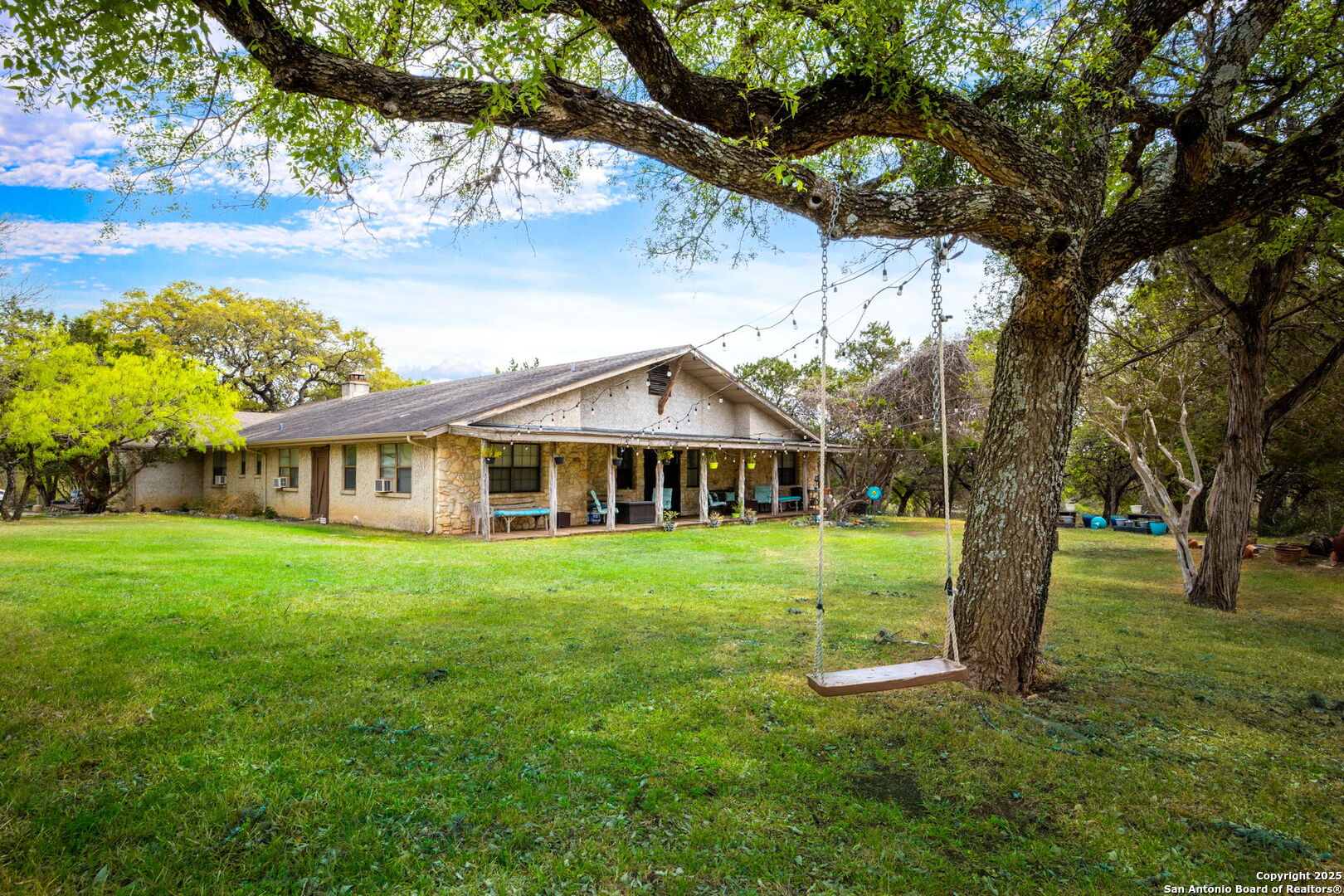 200 Elm Creek Road New Braunfels, TX 78132 - Photo 6 of 45 a view of a big garden with plants and large trees