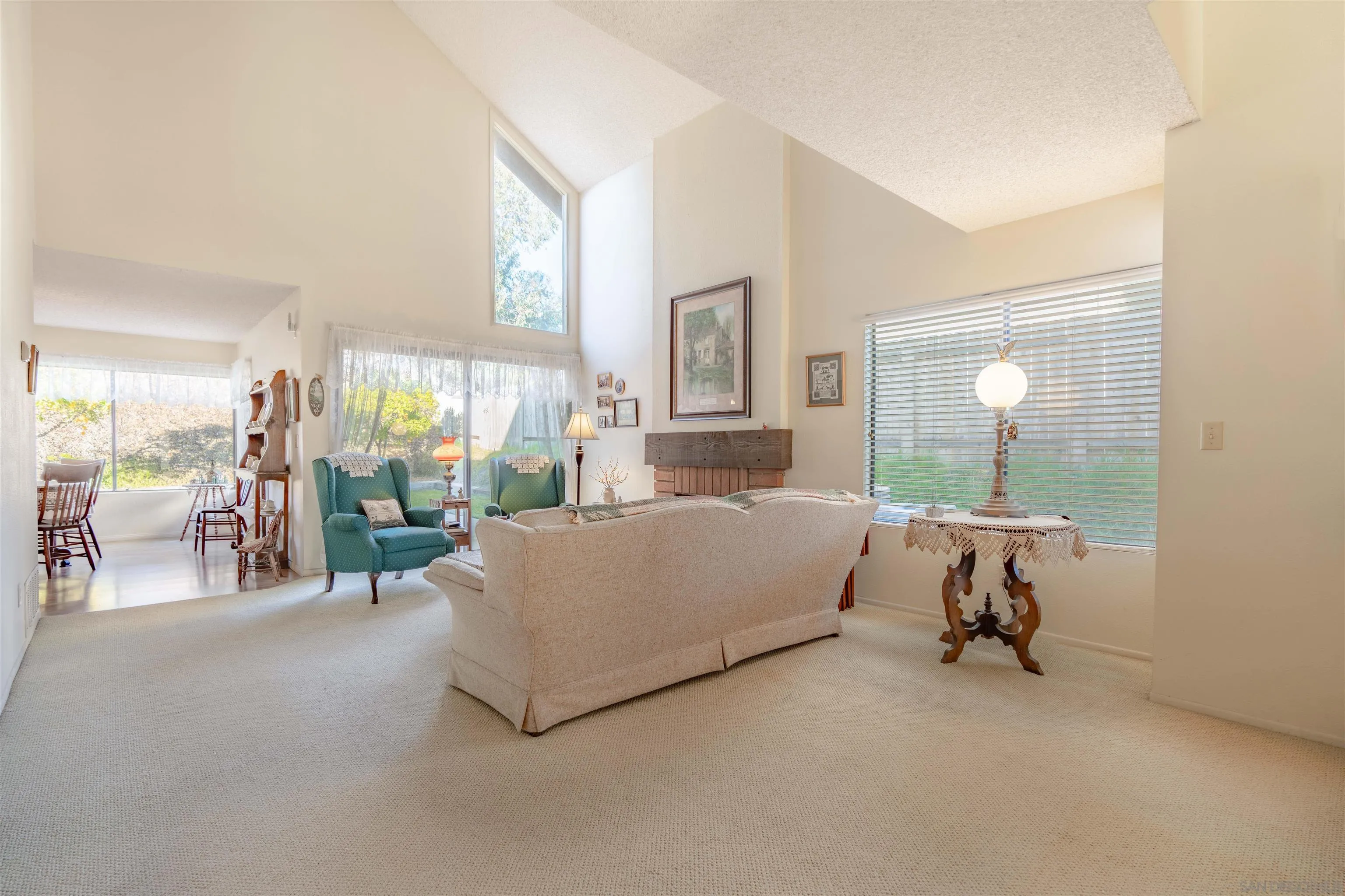 1440 Valleda Lane Encinitas, CA 92024 - Photo 4 of 54 a living room with furniture and a table