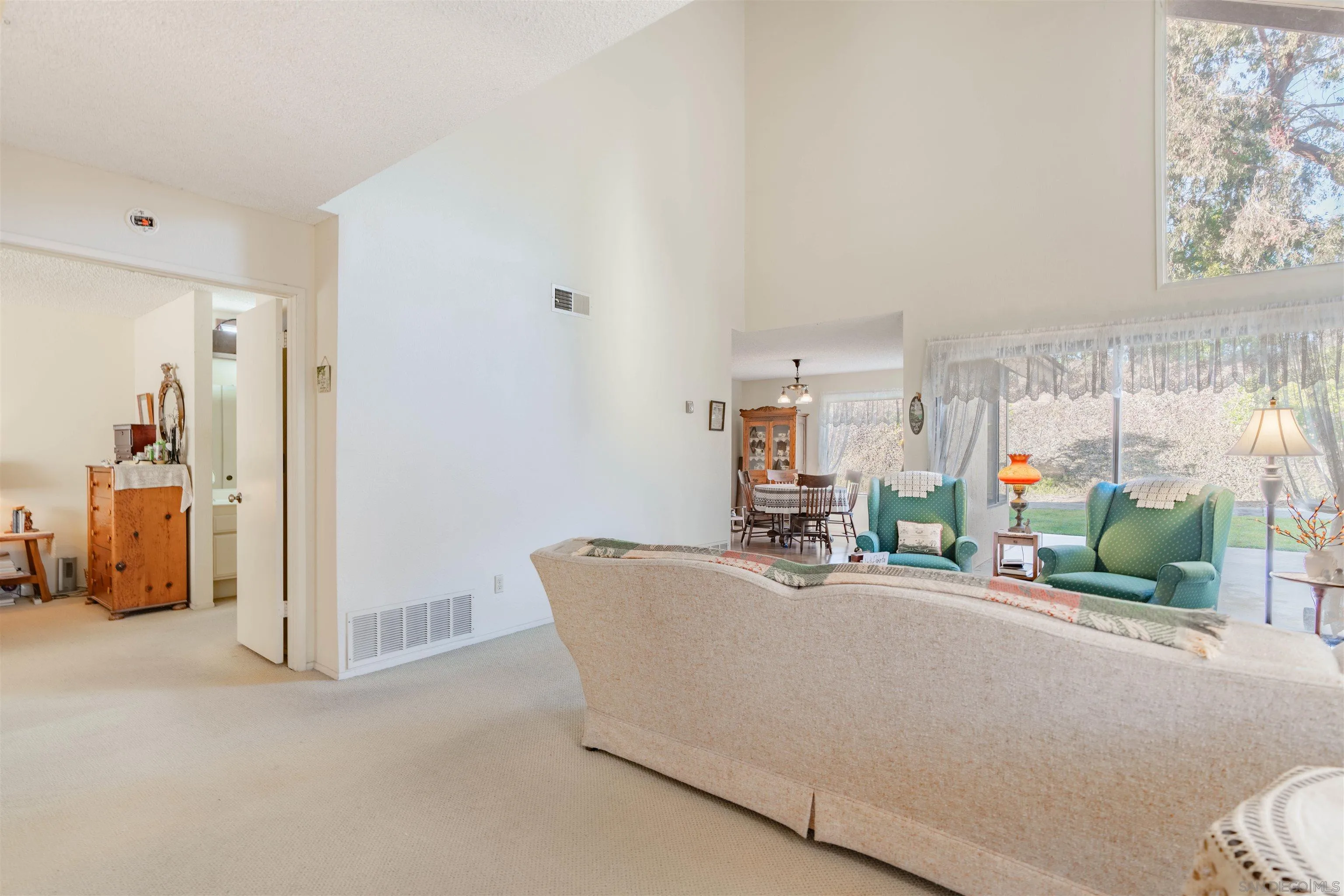 1440 Valleda Lane Encinitas, CA 92024 - Photo 5 of 54 a living room with furniture and a flat screen tv