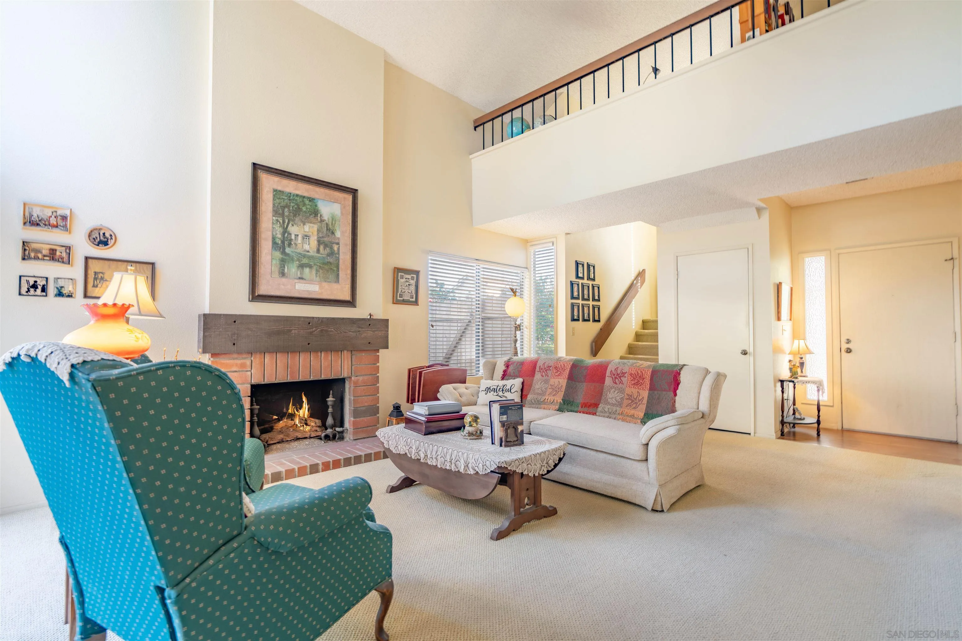 1440 Valleda Lane Encinitas, CA 92024 - Photo 7 of 54 a living room with furniture and a fireplace