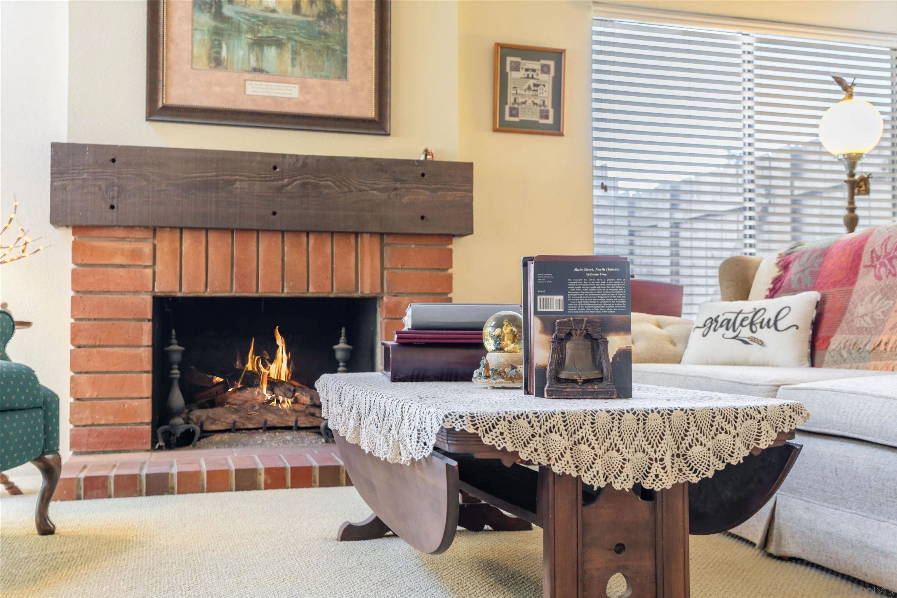 1440 Valleda Lane Encinitas, CA 92024 - Photo 9 of 54 a living room with furniture and a fireplace