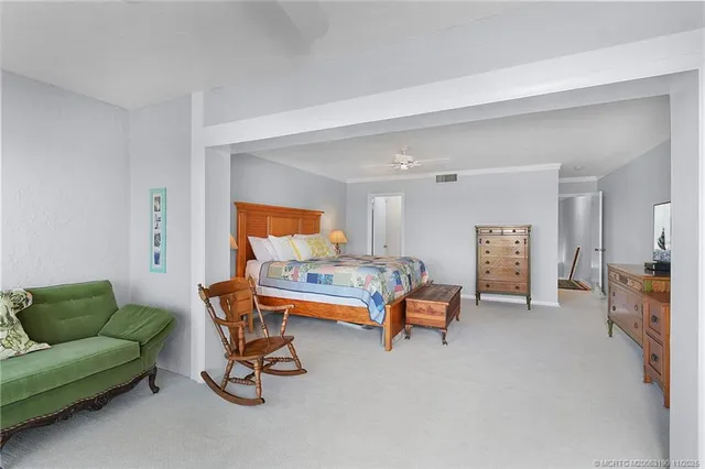 a room with furniture and a tv