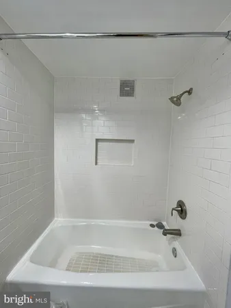 a bathroom with a tub