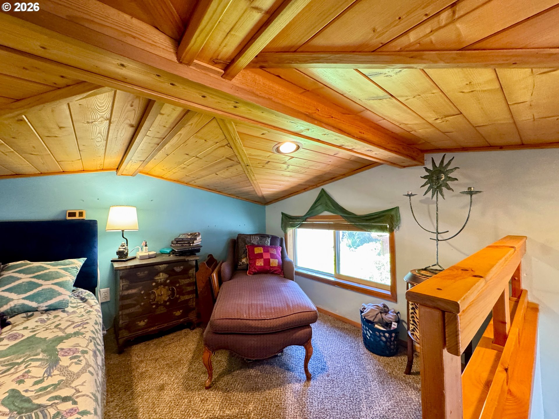 19921 Whaleshead Road, Unit U25 Brookings, OR 97415 - Photo 41 of 47 a bed room with furniture and a window