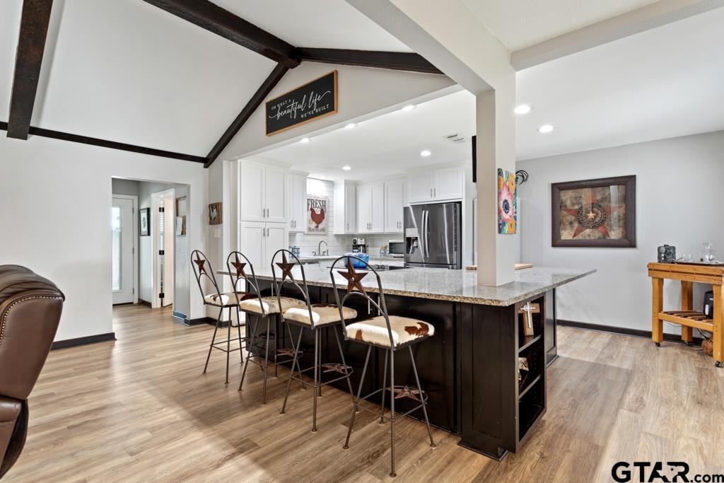106 Ridgecrest Circle Bullard, TX 75757 - Photo 11 of 32 a view of a dining room with furniture and wooden floor