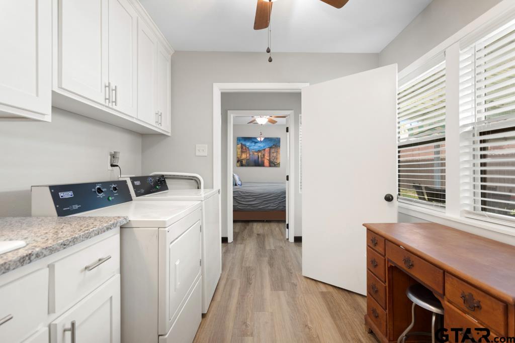 106 Ridgecrest Circle Bullard, TX 75757 - Photo 20 of 32 a view of a kitchen with fridge and wooden floor