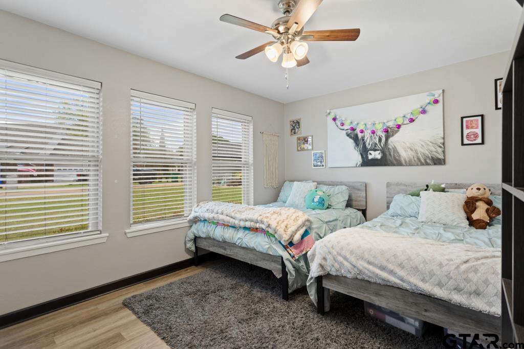 106 Ridgecrest Circle Bullard, TX 75757 - Photo 22 of 32 a bedroom with two beds and a window