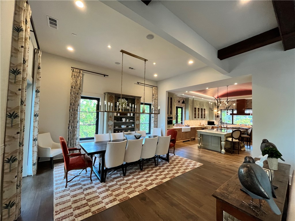 226 Long Ridge Road Sunset, SC 29685 - Photo 14 of 50 This spacious interior features a grand dining area seamlessly flowing into a stylish kitchen.