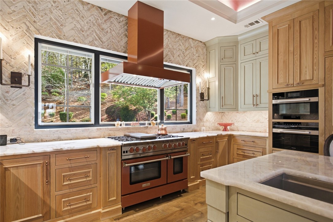 226 Long Ridge Road Sunset, SC 29685 - Photo 18 of 50 This kitchen features a beautiful range and ample counter space, perfect for culinary endeavors.
