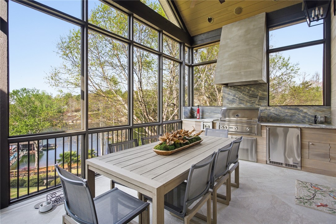 226 Long Ridge Road Sunset, SC 29685 - Photo 22 of 50 Enjoy outdoor entertaining with a fully equipped kitchen and stunning waterfront views.