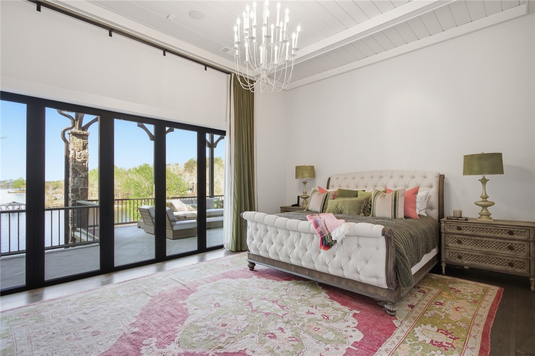 226 Long Ridge Road Sunset, SC 29685 - Photo 24 of 50 This primary bedroom offers an expansive view with direct access to a private balcony.