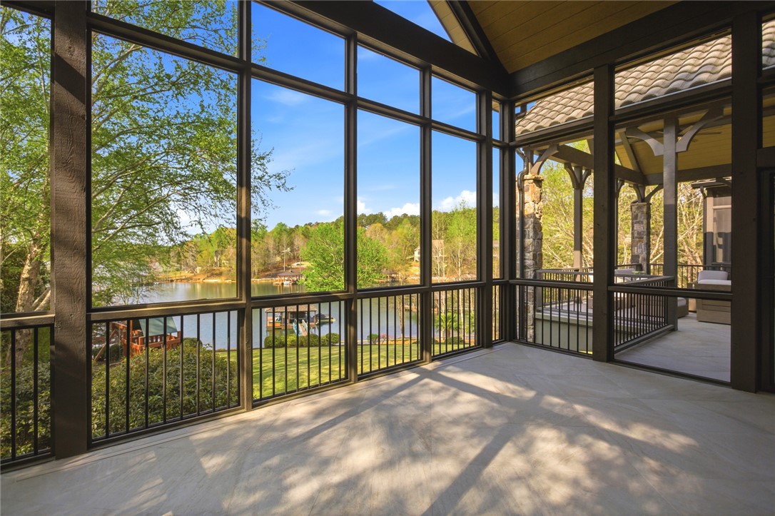 226 Long Ridge Road Sunset, SC 29685 - Photo 28 of 50 This screened-in porch provides sweeping lake views, perfect for peaceful mornings or vibrant evenings.