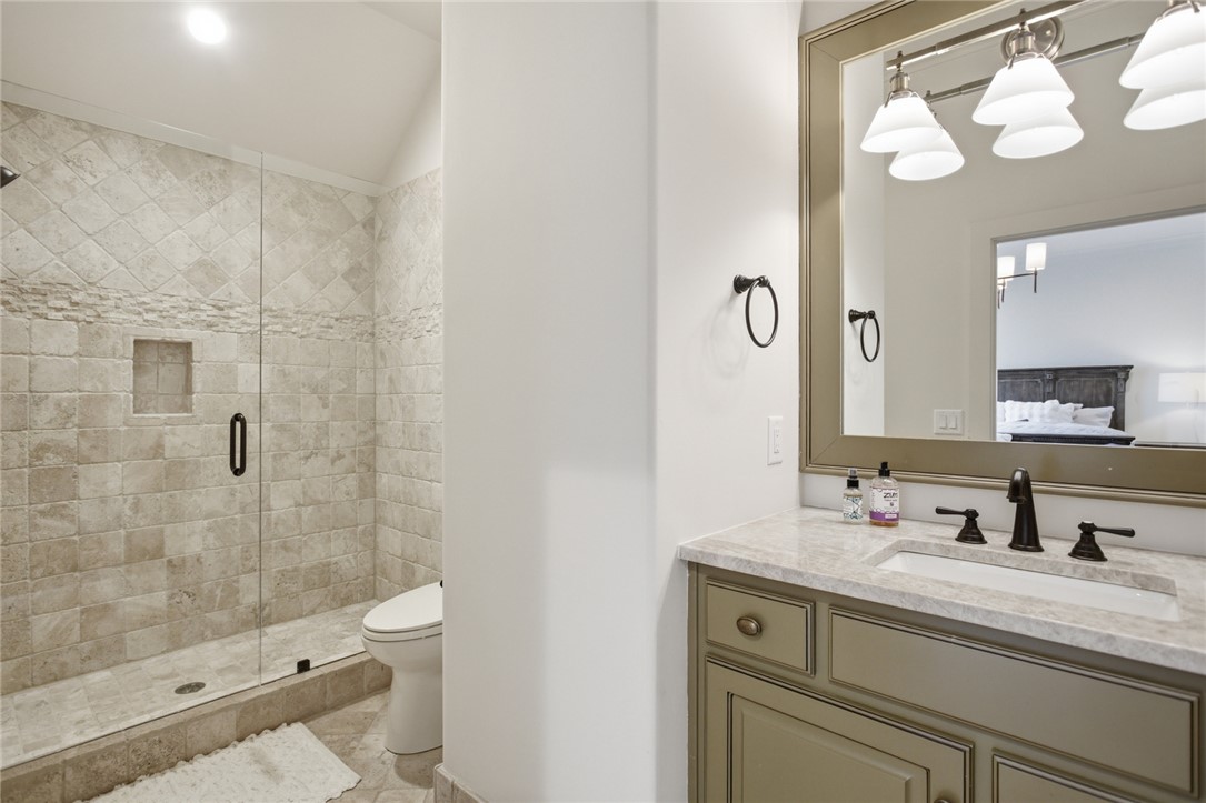 226 Long Ridge Road Sunset, SC 29685 - Photo 34 of 50 This serene bathroom offers a spacious shower and elegant vanity with modern fixtures.
