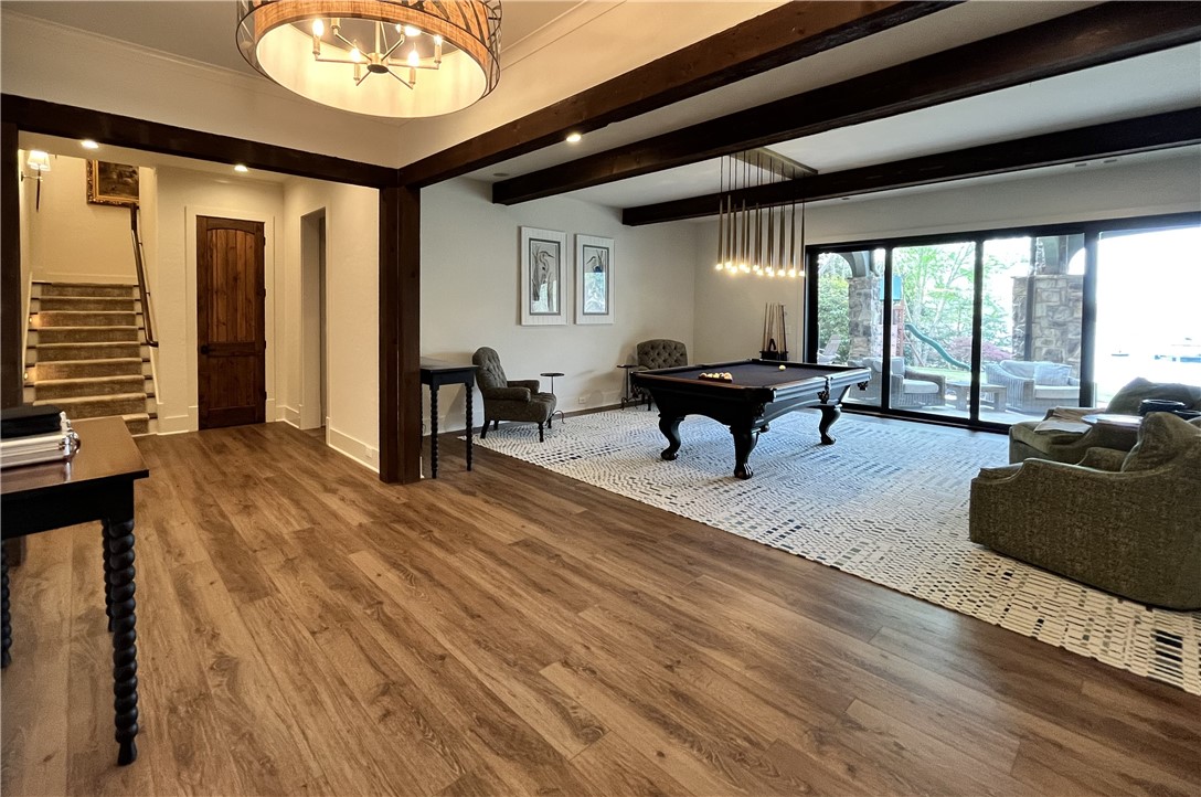 226 Long Ridge Road Sunset, SC 29685 - Photo 40 of 50 This versatile recreation room offers ample space for entertaining and leisure, with convenient access to outdoor living.