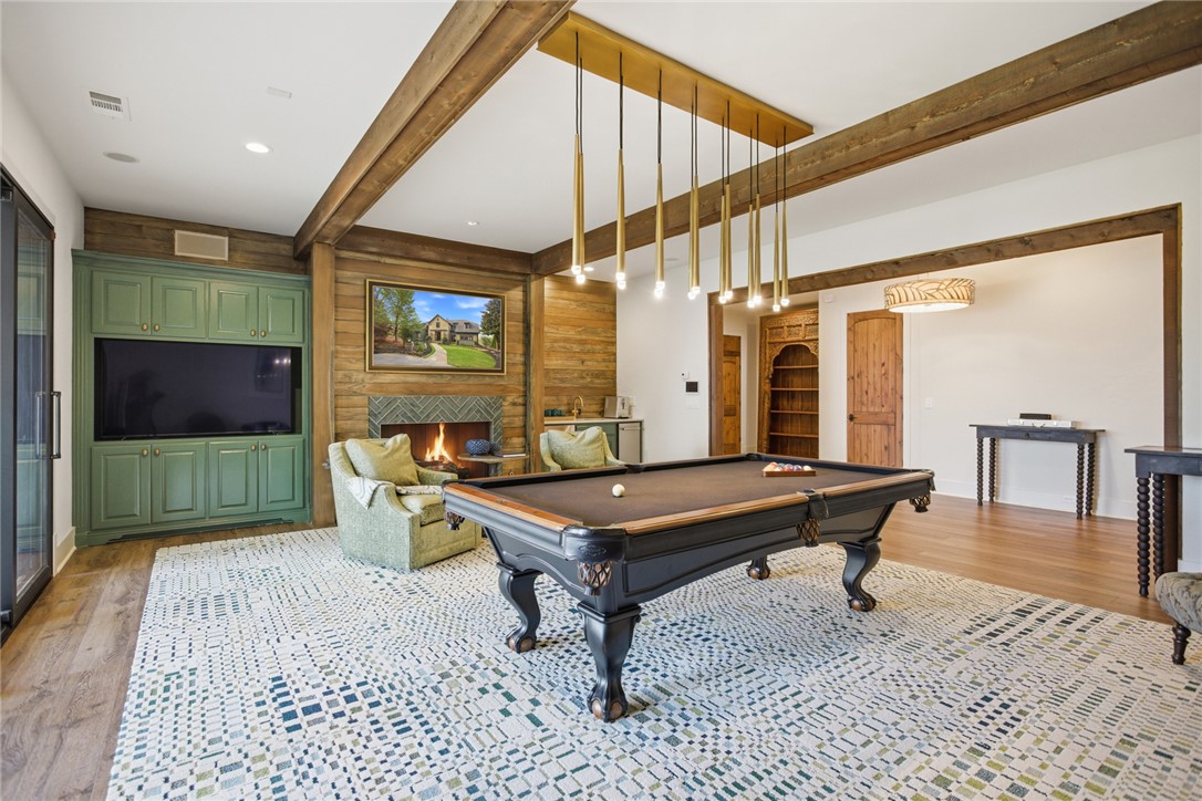 226 Long Ridge Road Sunset, SC 29685 - Photo 41 of 50 This inviting space offers a cozy fireplace and a dedicated area for entertainment.