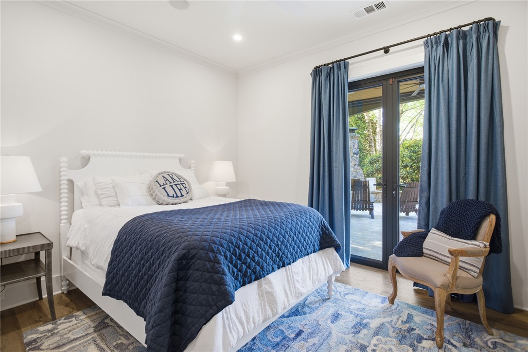 226 Long Ridge Road Sunset, SC 29685 - Photo 42 of 50 This cozy bedroom offers a tranquil retreat with convenient access to the outdoors.
