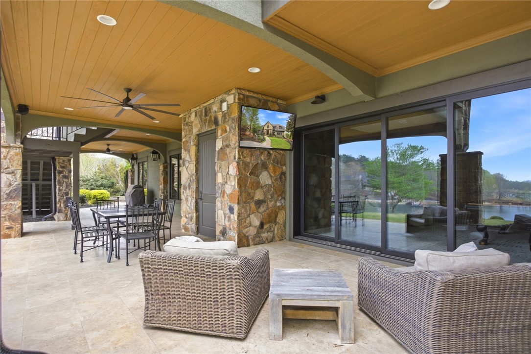 226 Long Ridge Road Sunset, SC 29685 - Photo 45 of 50 This expansive patio provides an ideal setting for relaxation and entertainment with picturesque outdoor views.